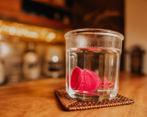 Haliya Cup menstrual cup in transparent glass with hot water for sterilization