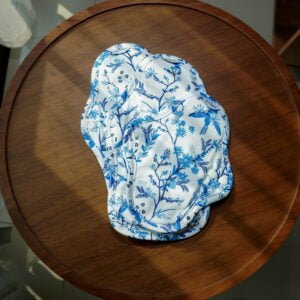 3 Sizes for light to heavy flow of Haliya Cup reusable menstrual cloth pad with microfleece surface fabric that is easy to wash, resists stain and durable. Waterproof PUL is used as back part with blue floral pattern.